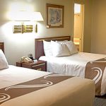 Our spacious double queen rooms are furnished with two queen sized beds,  table and 2 chairs, refrigerator, and microwave. Also, you have free access to fresh brewed coffee, hot chocolate, and tea at our coffee station. Join us in the morning for a wonderful continental breakfast. Enjoy your stay at the Big Sky Motel! Maximum Occupancy: 4